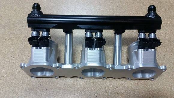 Dual injector/cylinder GT3 style intake manifold lower runners.