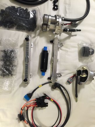 Overview of everything. Rails, baskets, fittings, and wiring to connect into the stock harness.