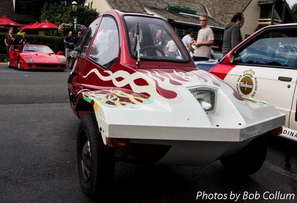 A 1980 HMV Freeway microcar, across from Allie's F40.