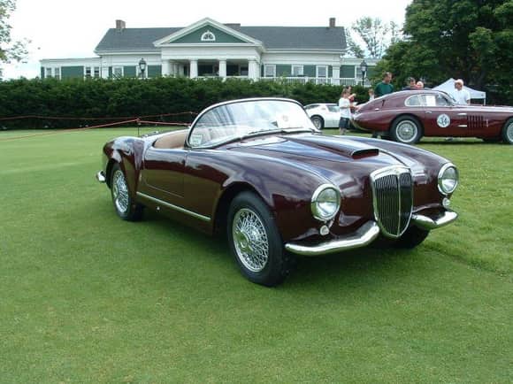 visiting the PVGP Cortile:  1955 Lancia Aurelia. This Pininfarina designed beauty is one of 239 built, seven of which found a watery grave on the Andrea Doria. Motivation comes from Lancia's pioneering 110-horsepower V-6 engine, which is mated to a rear-mounted transaxle for ideal weight distribution. The folding top disconnects completely from the body for storage behind the front seats.