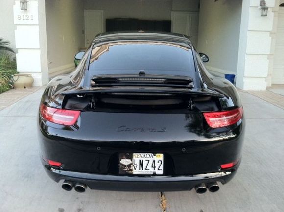 Removed the factory badgind and replaced with all black "Carrera S"