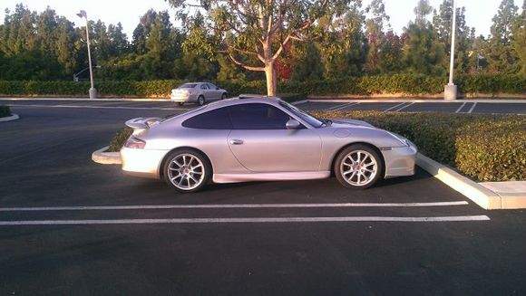 Side profile of Turbo front end, OEM flared rocker panels, GT3 wheels and Carrera Spoiler.