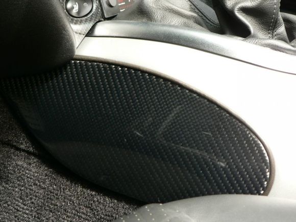 MAcarbon front console bolsters.