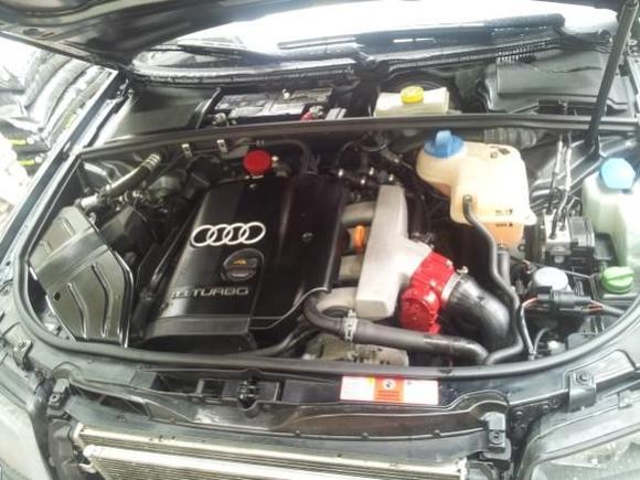 First mods. Cleared black plastic engine cover, air duct and cabin filter cover. Also painted DV valve and throttle body gloss red with about 6 coats of clear.

So far keeping budget low, but more sure to come.