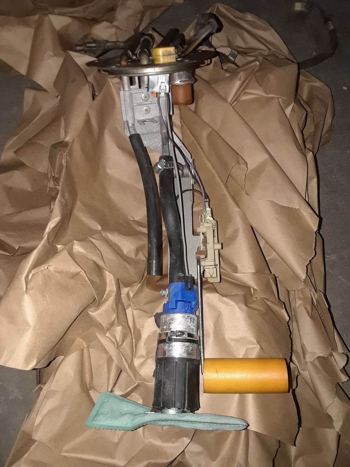 I took 2 pics to be safe, i currently have a fuel pump assembly named TRQ  in my 94z28 camaro m6, my old fuel pump which was an OEM with the sending unit/floater like this, but the TRQ one has a different floater, my camaro runs n drives nice, but my fuel gauge/ needle jumps/ tweaks way past F when i floor it, when i stop its goes between 3/4 and F, but idk if with this TRQ fuel pump is good, so i went on ebay n got this one from a 112k mileage 95z.