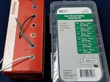 On the left is a 22 gauge wire assortment I purchased from Amazon. On the right is a heat shrink tubing assortment I purchased from Home Depot. Individual heat shrink tubing sizes are also available in smaller quantities in various sizes.