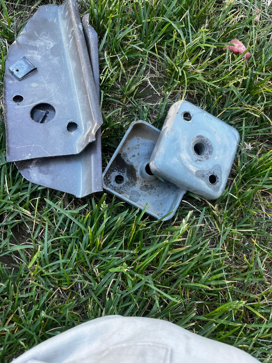 Drill out spot-welds. 