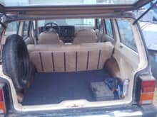 I used a section of rubber backed mat/carpet for the trunk