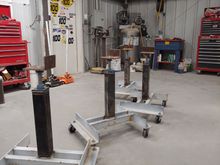 24 inches tall and adjustable for level.