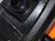 nipple on reservoir that plugs into the side of the pump. Note the step/shelf 