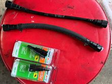 I made a new fuel line to replace the OEM one. Oddly enough, the line diameter is 5/16 inch at the line and 3/8 inch at the pump. 