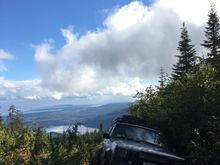 Making it to the top of the abandoned ski hill! Got to the chairlift at the top. Took a bit of a beating this day. Lots of narrow trees/brush. Took out a mirror and corner marker, and rear bumper cap. Lots of new scratches and found out my front driveshaft is on its way out. Slip part of it is loose. Loaded up with grease for now.
