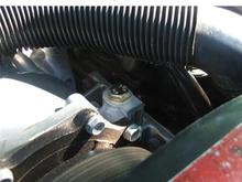 Alternate AC Compressor Hold Down Bolt Installed