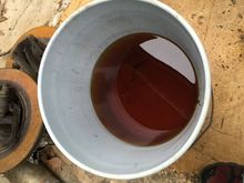 Dropped the tank and this is the state of the old fuel looks like I'll have some parts cleaner