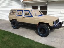 All painted and I knew it would not look very good but ended up A little worse than I was hoping so I ordered Bedliner and painted it again. Also this has the wheels and tires that I decided on with the rubicon express 2 inch lift. Tires are 32 1150 cooper at3