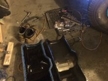 Thought replacing the oil pan and gasket would help fix the leak I have, but some research as lead me to believe it's easier to just swap in a newer motor than attempt to fix it