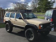 It is 52x72. 1 inch steel tube, metal grate, jcr gutter mounts and a aluminum wind deflector with a Yakima sticker to look legit.