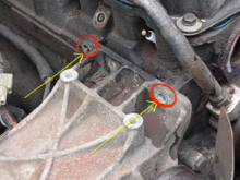 top bolts for the A/C compressor bracket that bolts into cylinderhead?