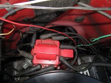 red wire from batt wasnt pluged in was connected to a plug in 3 way like would plug in to a fuse end was hooked up with a wire labeled fuel that goes to a white wire then under toward trans