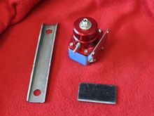 Fuel regulator and the mounting bracket fabrication.