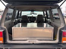 Had a buddy build up a aluminum drawer for the rear of the jeep.