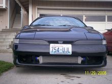 my 90 awd turbo talon. Front mount intercooler, blitz blow off, water/meth injection, 9.3-1 compression, big 16 turbo, havent been on dyno but can beat well known 400 hp cars. But now its broked!!