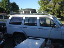 Bare roof rack completed. To build one of these you can find the instructions posted by forum members gornikebounder and warthog. It cost $60 to build and took the better part of a day. Beats paying $300  for a store bought one. Thanks for your contribution guys.