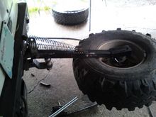 tried 2 Steering Damper shocks on it but dont work..so i went with springs..it works pretty good.