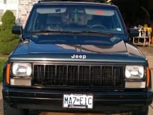 Jeapster.4 1994 Jeep Cherokee Sport 4x4, Auto , Hunter Green metallic, Front end