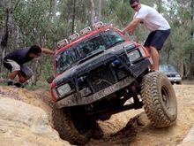 that's a dry part of the trail I have a lil trouble BC my sway bar is attached. And I'm not lifted...so I tend not to do this one