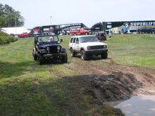 My Jeep is the white Cherokee. My Brothers Jeep is the 95 Wrangler with a CJ front clip