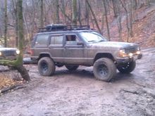 3) added 1.5 spacer n shackles, home made roof rack, fog lights