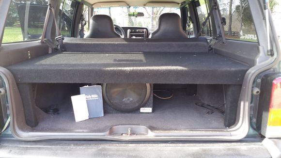 The Bible and the Constitution: two books I will always keep in my Jeep. I also have a sub in the back as well as a custom built raised platform for safety and to boost the sound of the sub.