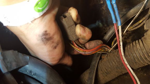 2nd round, these wires melted on driver side, near air cleaner. yellow pieces attach to vacuum lines. not sure what this whole thing is? connects to pigtail that had a red/white wire, potentially same red/white wire as from 1st melted green wire?