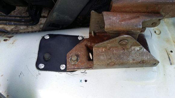 Sheet metal patch made for the ebrake hole.