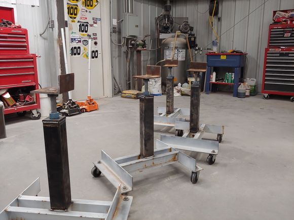 24 inches tall and adjustable for level.