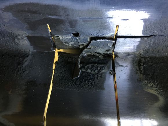 Then make your connecting cut. The piece of the seam that’s bent out will the be only held on with one spot weld. Pry that piece off and I just leave primer to clean off!