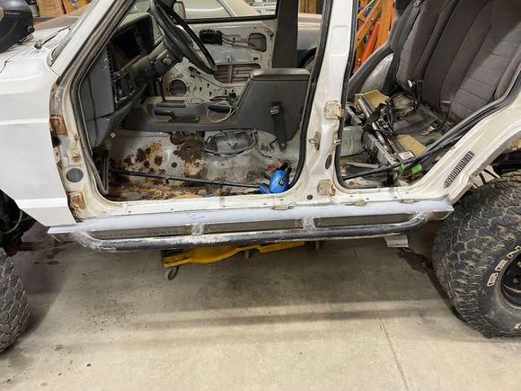 Driver's side rocker tacked in.