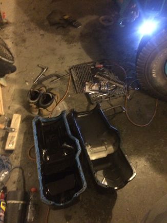 Thought replacing the oil pan and gasket would help fix the leak I have, but some research as lead me to believe it's easier to just swap in a newer motor than attempt to fix it