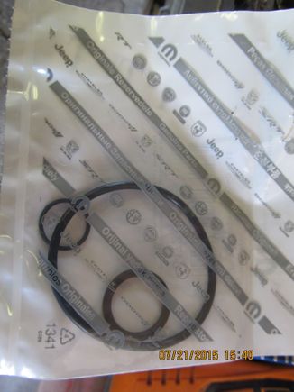 The Mopar gasket set comes with three gaskets. one for the adapter, 2 for the bolt.