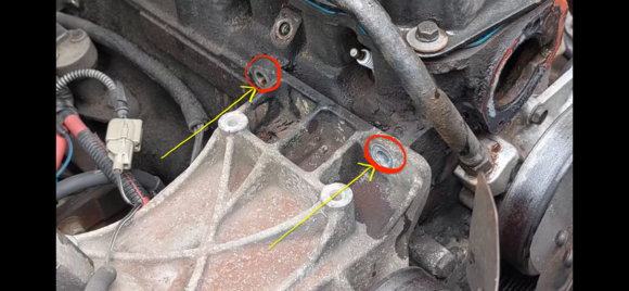 top bolts for the A/C compressor bracket that bolts into cylinderhead?