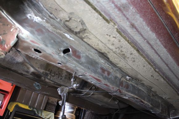 Unibody "frame" rails are prepped for the stiffeners.