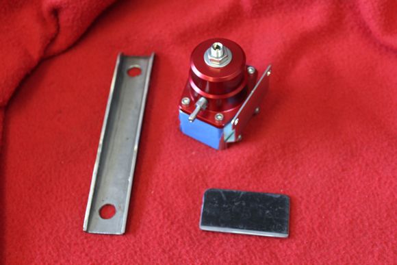 Fuel regulator and the mounting bracket fabrication.