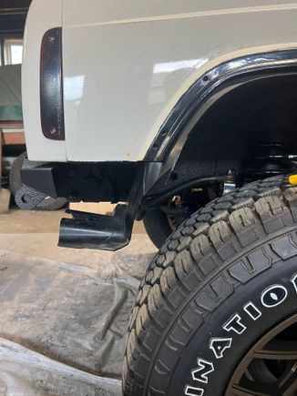 The plastic wheel well liners need a trim 