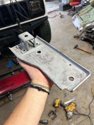 Transmission mount plate and hanger bracket sandblasted 