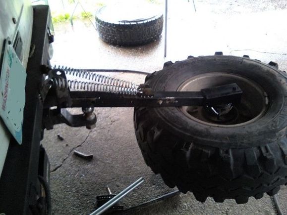 tried 2 Steering Damper shocks on it but dont work..so i went with springs..it works pretty good.