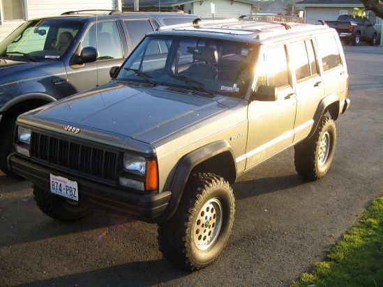 Sittin in the driveway at my old house right after the lift and new tire install