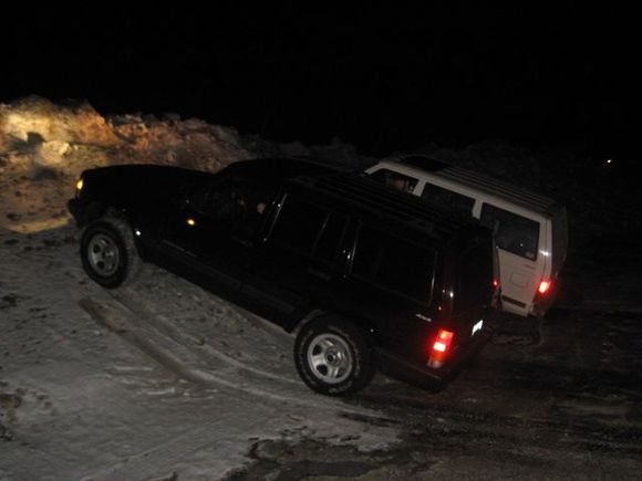 climbing some snow piles