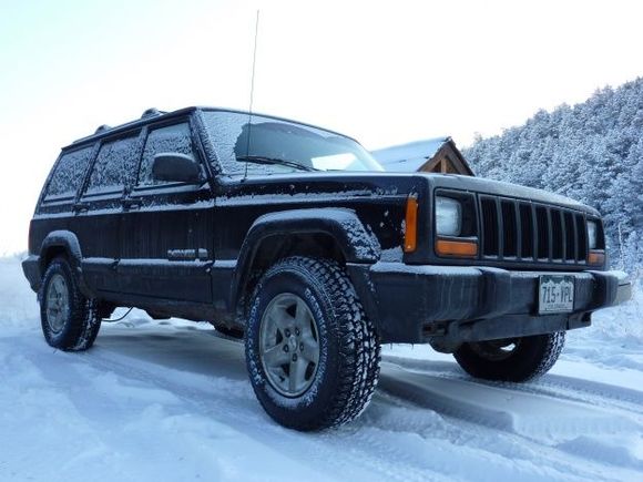 Stock XJ with new 225/75/15 Firestone Destination A/T's.