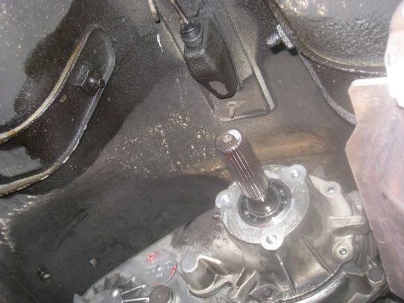 rear shaft removed and first part of dust cover on t-case removed.